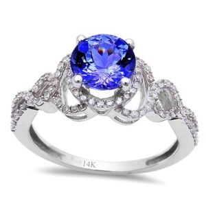 white gold tanzanite and diamond engagement ring